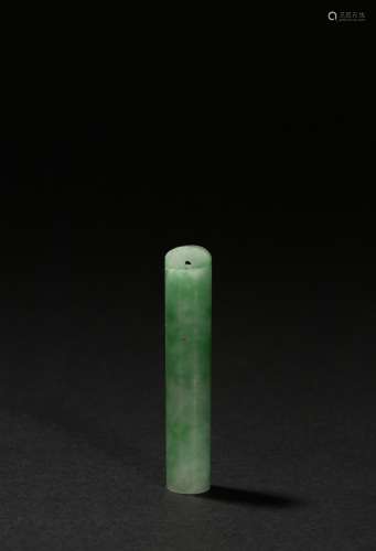 A jadeite carved tube pendant