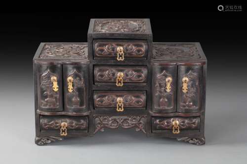 A carved zitan jewellry cabinet