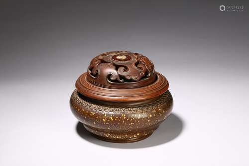 A large bronze gilt-splashed censer