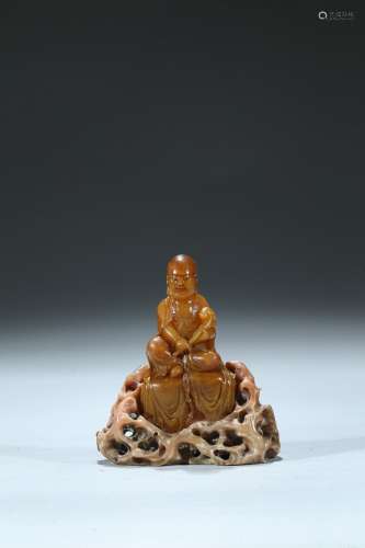 A shoushan soapstone arhat with stand