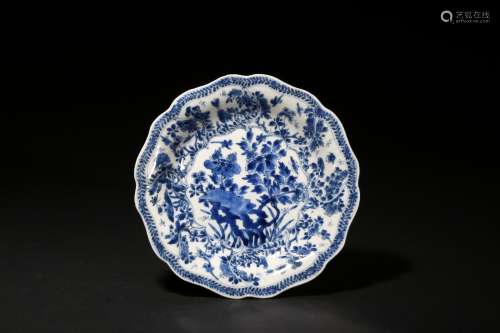 A blue and white 'flowers and butterfly' dish
