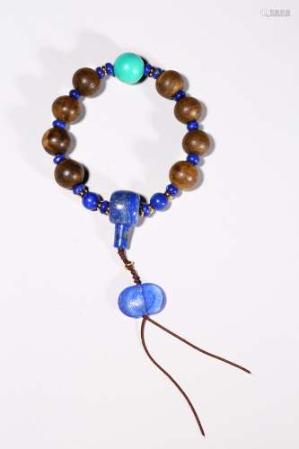 An agarwood turquoise lapis lazuli bead rosary bracelet