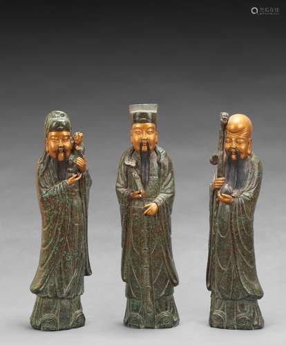 A group of three large porcelain figures of immortals