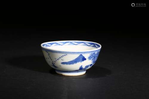 A blue and white landscape bowl