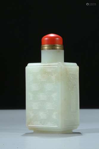 A white jade faceted carved snuff bottle