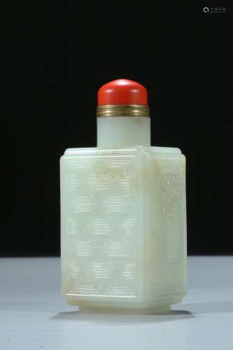 A white jade faceted carved snuff bottle
