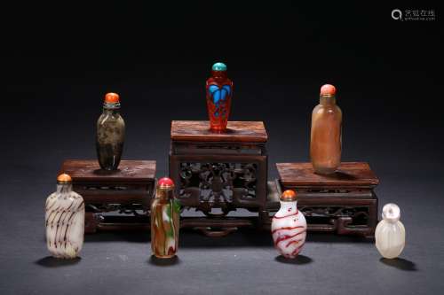 A group of seven various snuff bottles
