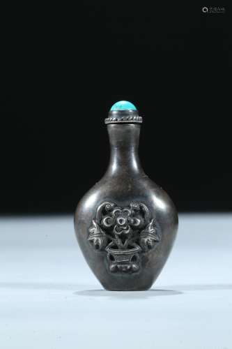 A silver carved 'flower basket' snuff bottle.