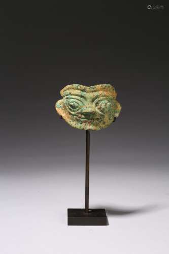 An archaic bronze mythical mask