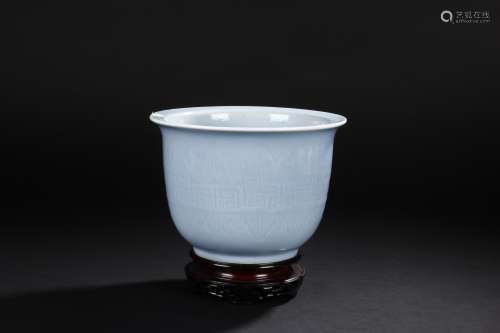 A moulded Yingqing celadon glazed jar