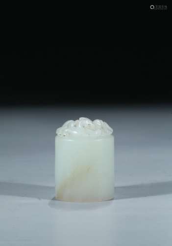 A white jade 'chilong' seal