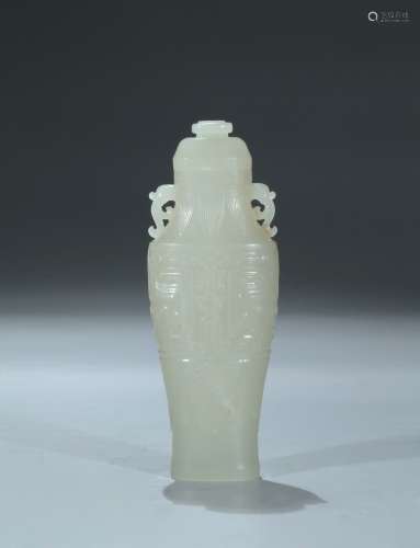 A white jade carved archaistic vase and cover