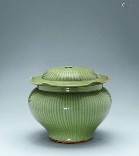 A rare longquan celadon ribbed jar and cover