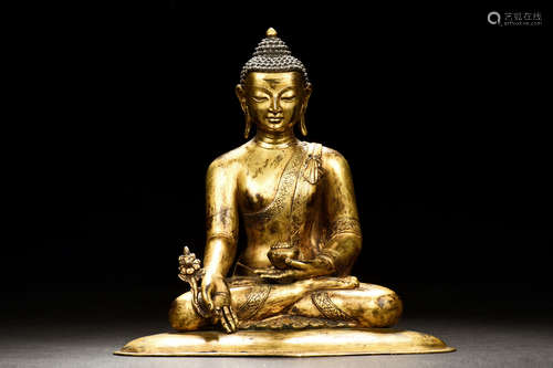 GILT BRONZE CAST BHAISAJYAGURU SEATED FIGURE