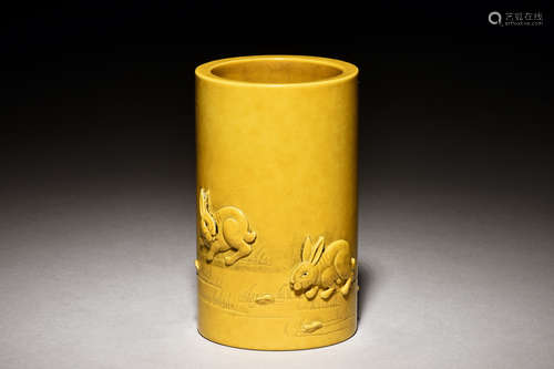 YELLOW GLAZED 'RABBITS' BRUSH POT