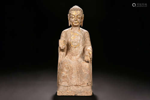 PARCEL GILT LIMESTONE SHAKYAMUNI SEATED FIGURE