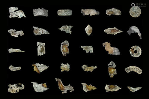 GROUP OF THIRTY ARCHAIC JADE PIECES