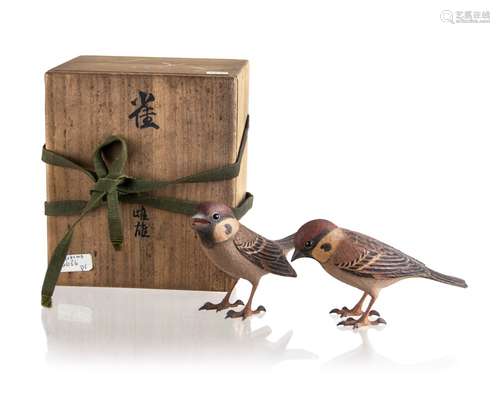 414. A  PAIR OF WOOD CARVED SPARROWS