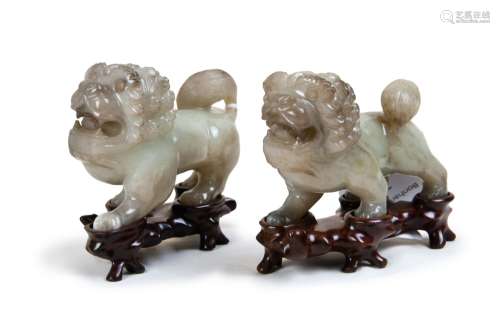 78. PAIR OF CARVED NEPHRITE FOO LIONS ON BASES