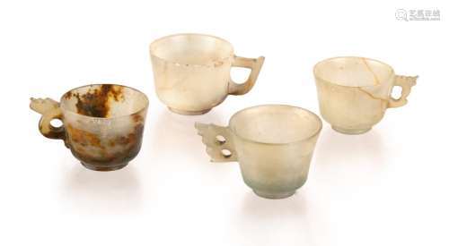 71. GROUP OF FOUR JADE CARVED WINE CUPS