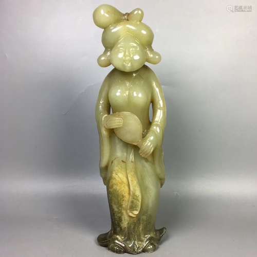 A CARVED HETIAN JADE FEMALE FIGURE