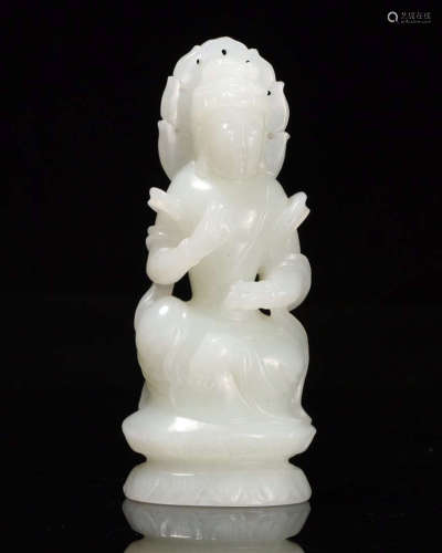 A HETIAN JADE CARVED FIGURE OF GUANYIN