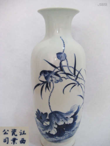 A BLUE AND WHITE VASE WITH CHARACTERS MARK