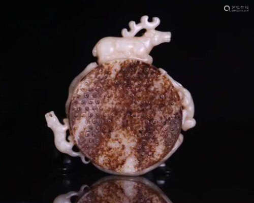 A HETIAN JADE PENDANT WITH BEAST DESIGN