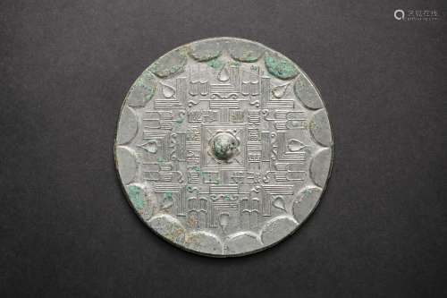 A Chinese Bronze Mirror with Interlocking  Patterns from Western Han Dynasty