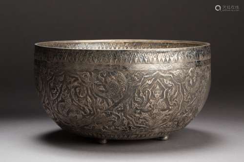 A Chinese carved silver tripod basin from Ming Dynasty