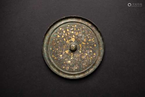 A Chinese rare gilt gold and silver on pewter mirror from Warring States period