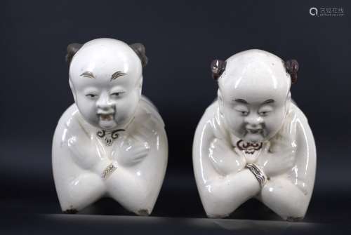 A pair of porcelain child pillows from Qing Dynasty