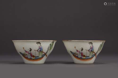 A pair of pastel famille-rose figural cups with Daoguang mark