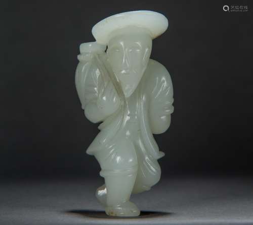 A Carved Hetian White Jade Figure of a Fisherman from Qing Dynasty