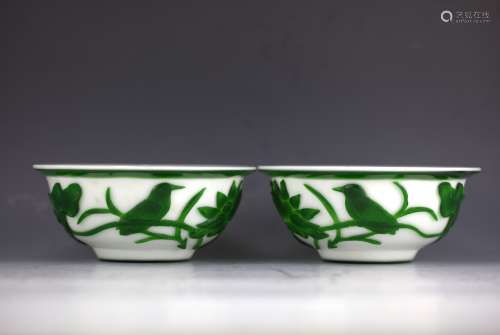 A pair of 19th century Peking glass bowl green on white-ground