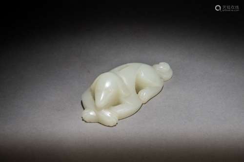 A Carved Hetian White Jade Figure of a Canine from Qing Dynasty