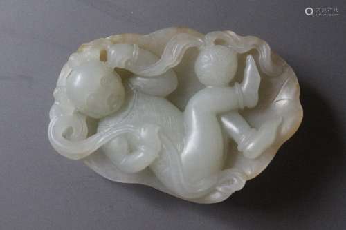 A Carved White Jade Figure of Child Playing Ball from Qing Dynasty