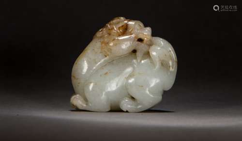 A Carved Hetian White Jade Figure of a Qilin from Qing Dynasty