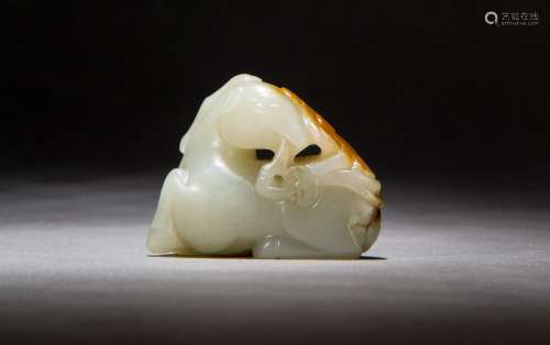 A Carved Hetian White Jade Figure of a Deer from Qing Dynasty