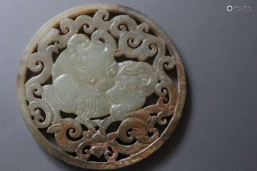 A Carved white Jade Pendant of an Auspicious Ox from Qing Dynasty