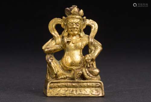 5 A gilt bronze figure Buddha guardian from Qing period