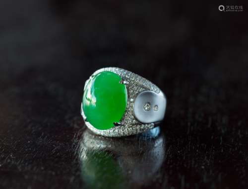 A Large Top Quality Natural Intense Emerald Green Jadeite Diamond Ring.