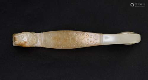 Ming or Earlier- A White Jade Dragon Head Beltbuckle