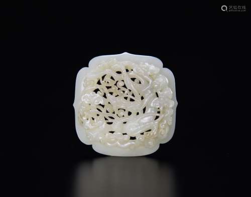 Yuen/Ming - A White Jade Carved Dragon Pendant