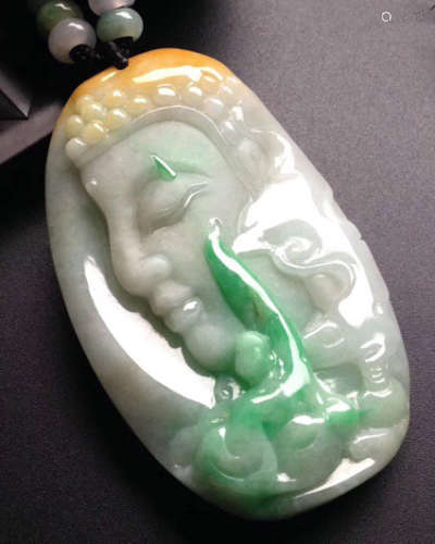 A NATURAL JADEITE BUDDHA DESIGN PENDANT