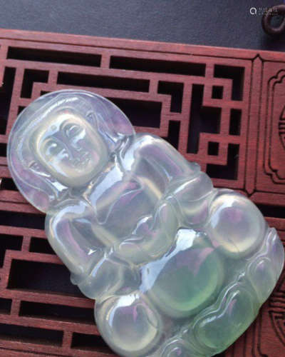 A NATURAL JADEITE GUANYIN DESIGN PENDANT