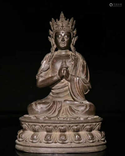 A BRONZE CARVED FIGURE OF GUANYIN