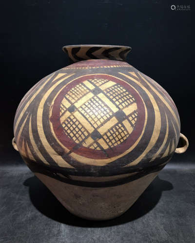 A PAINTED POTTERY OF JAR
