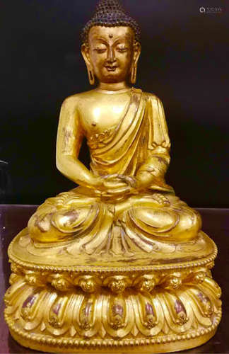 A GILT BRONZE CARVED FIGURE OF SHAKYAMUNI