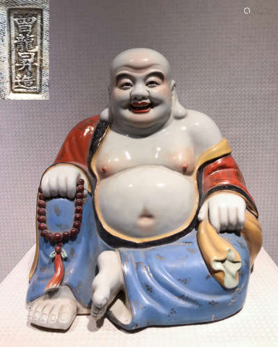 A LAUGHING BUDDHA FIGURE WITH ZENGLONGHSENGZAO MARK